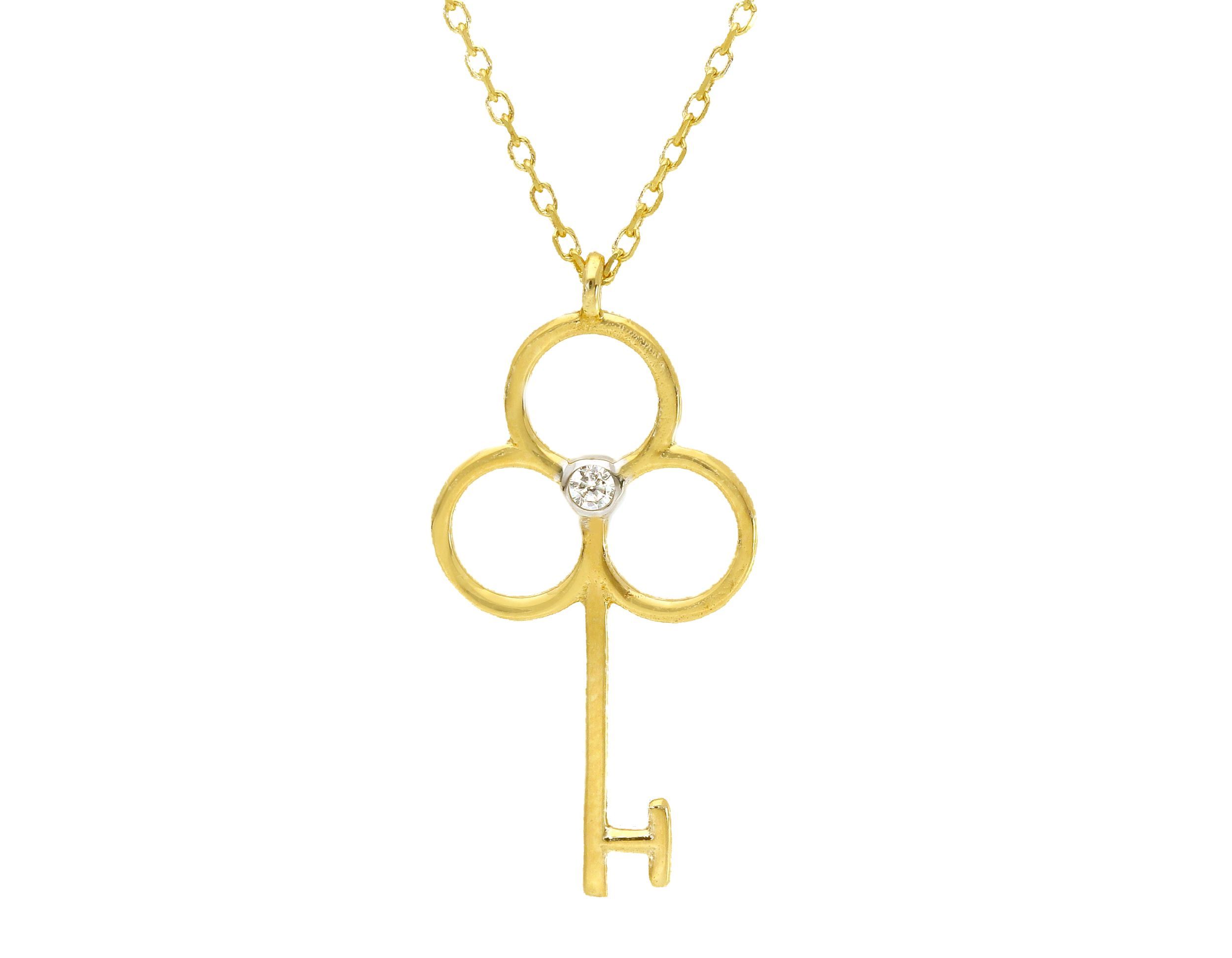 Golden key necklace with white zircon (code S258665)